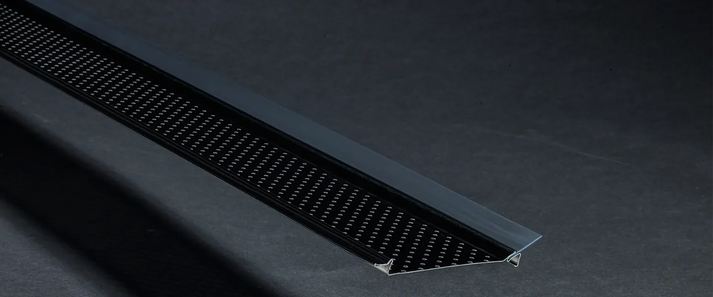 Alu-Rex Gutter Clean System perforated aluminum gutter guard in Carbon Black