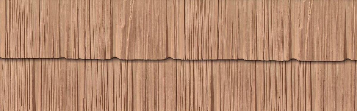 Foundry Staggered Shake polymer cedar siding in red cedar on Ontario home exterior