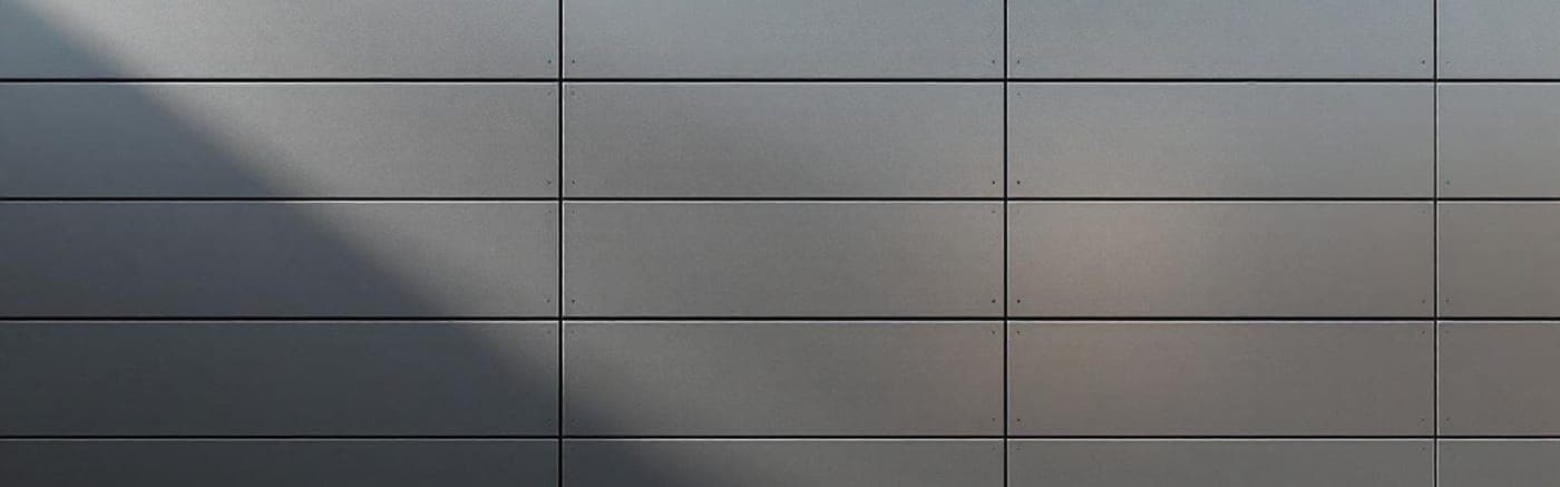 Kaycan Alu-Composite S-100 aluminum composite panels on a modern commercial building facade