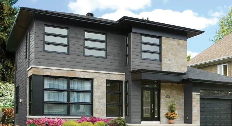 Ced'R-Vue™ 9″ CanExel engineered wood siding in Granite on a home exterior