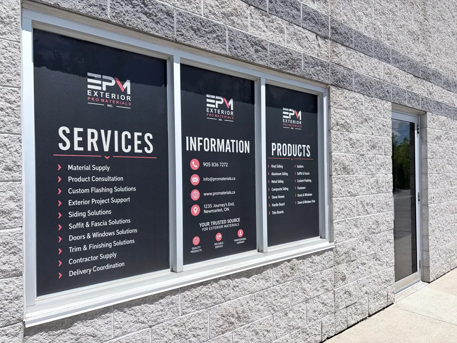 Exterior Pro Materials storefront at Unit 5, 1235 Journey's End Circle in Newmarket, with Services, Information and Products window graphics